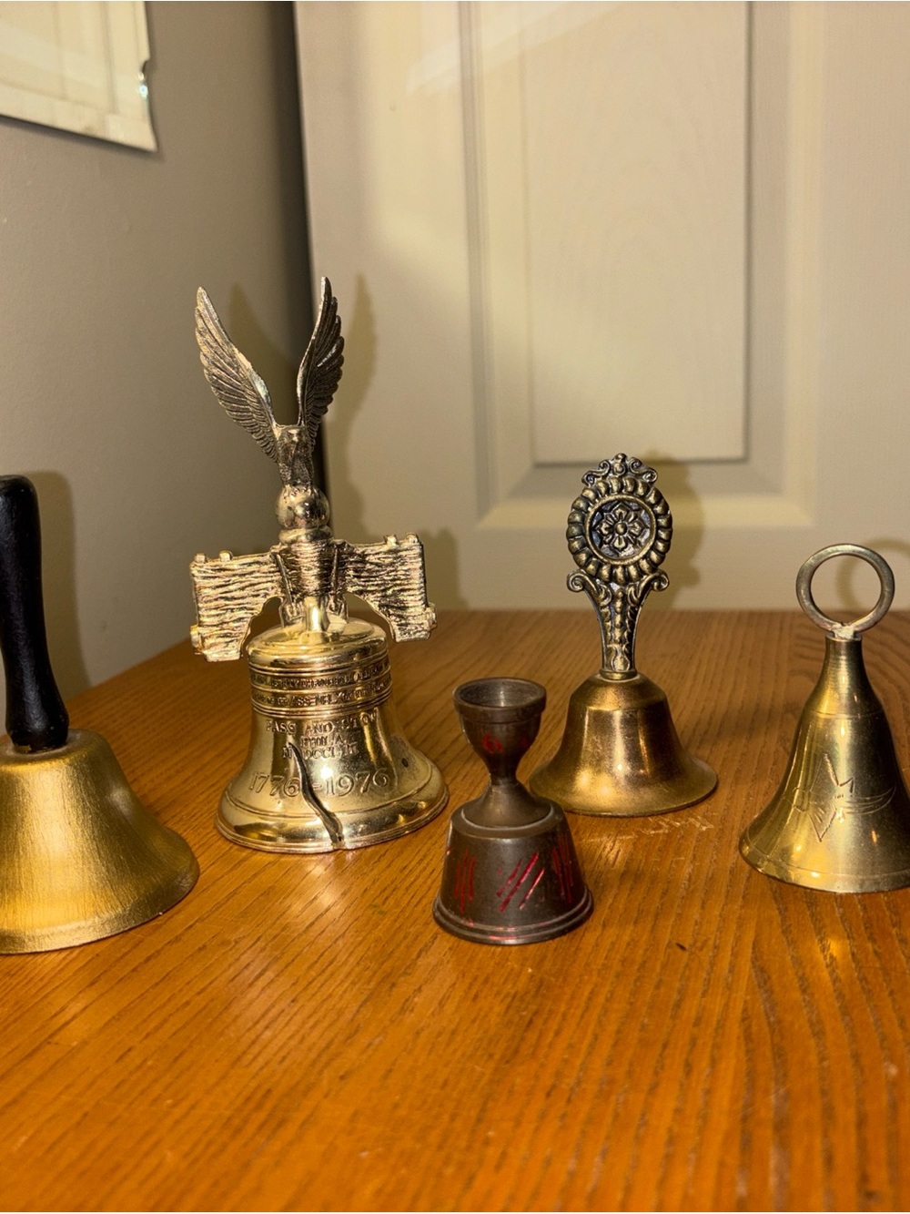 A set of 5 brass bells